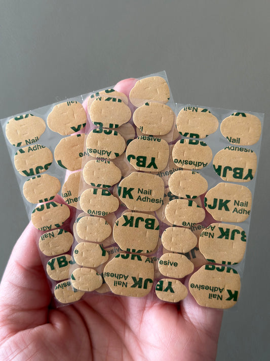 10 Sheets glue tabs nails (24 each sheet)